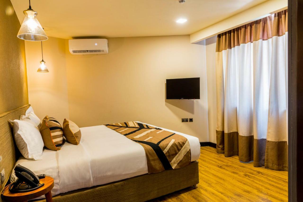 Speke Apartments Kitante Kampala Esterno foto